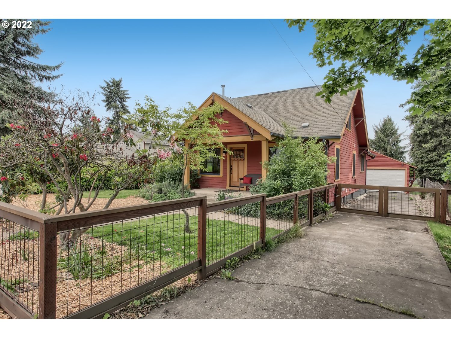 4347 Northeast Sumner Street Portland, OR 97218 - Photo 2 of 25 a view of a house with a yard and sitting area