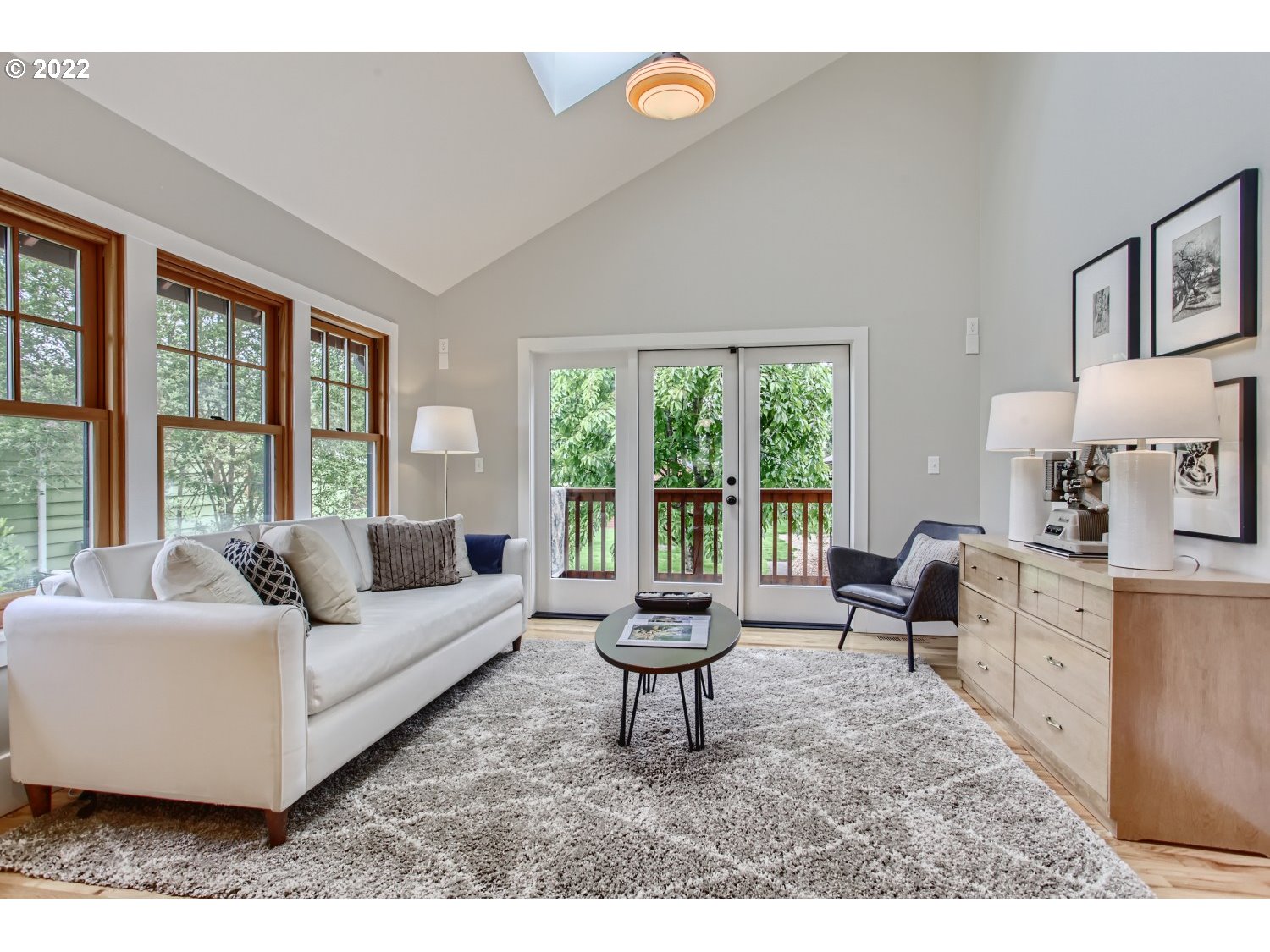 4347 Northeast Sumner Street Portland, OR 97218 - Photo 9 of 25 a living room with furniture and a large window