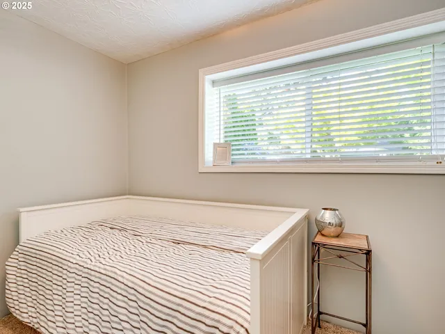 a view of a room that has a sink and a window