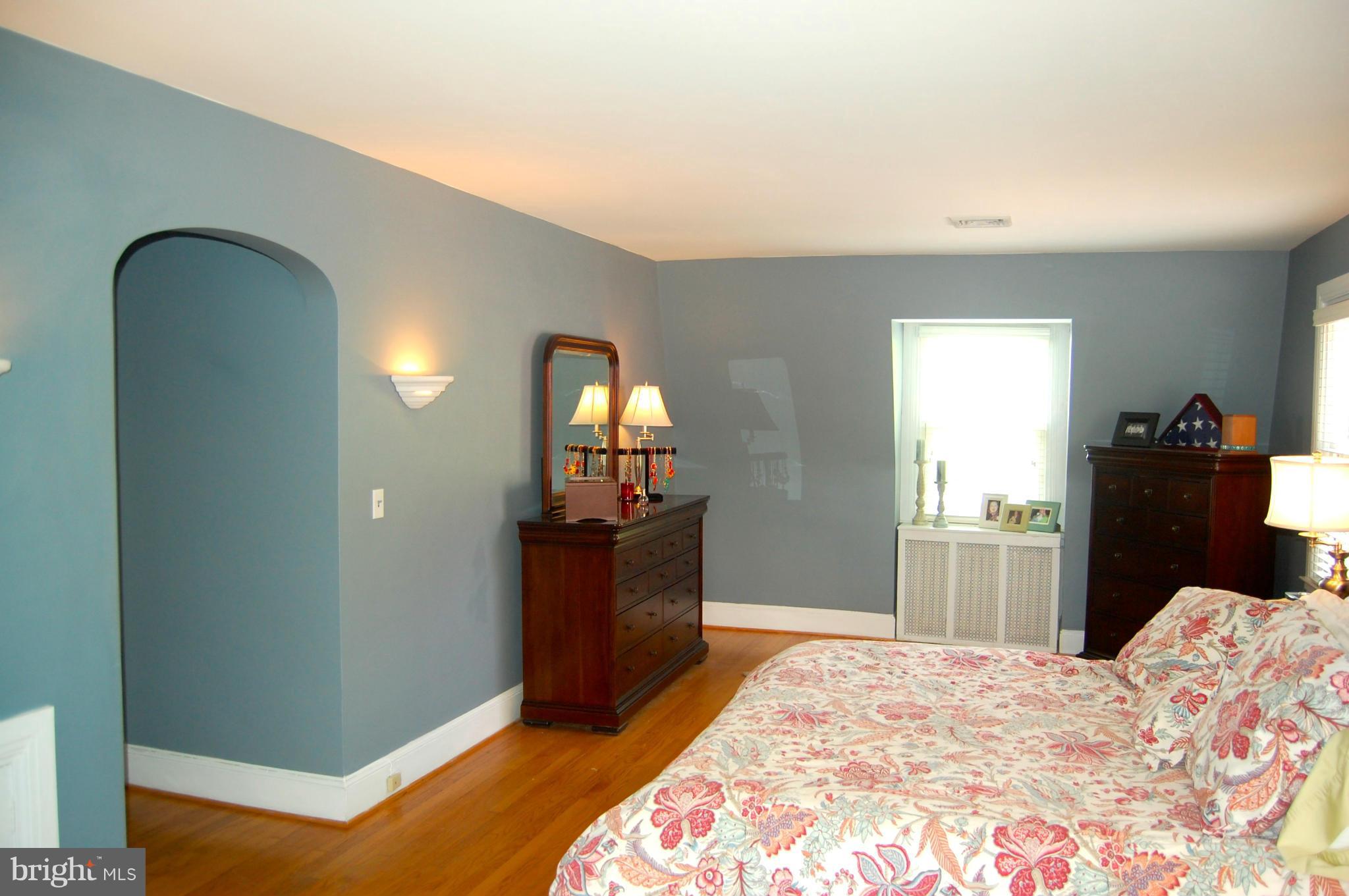 345 Tunbridge Road Baltimore, MD 21212 - Photo 17 of 30 a bedroom with a bed and a dresser