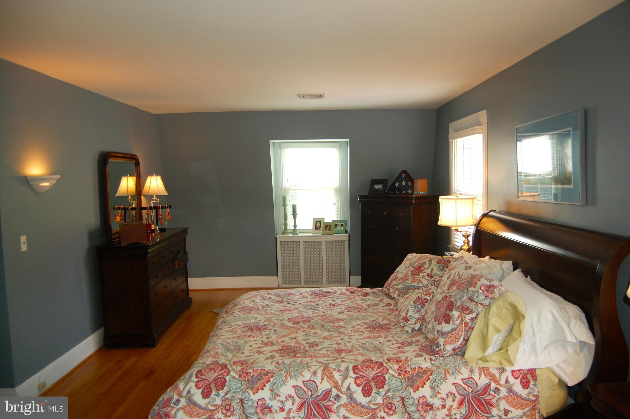 345 Tunbridge Road Baltimore, MD 21212 - Photo 19 of 30 a bedroom with a bed and wooden floor
