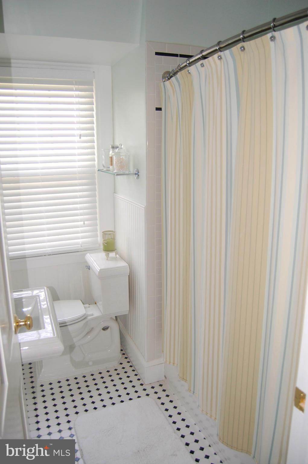 345 Tunbridge Road Baltimore, MD 21212 - Photo 23 of 30 a bathroom with a sink toilet and shower