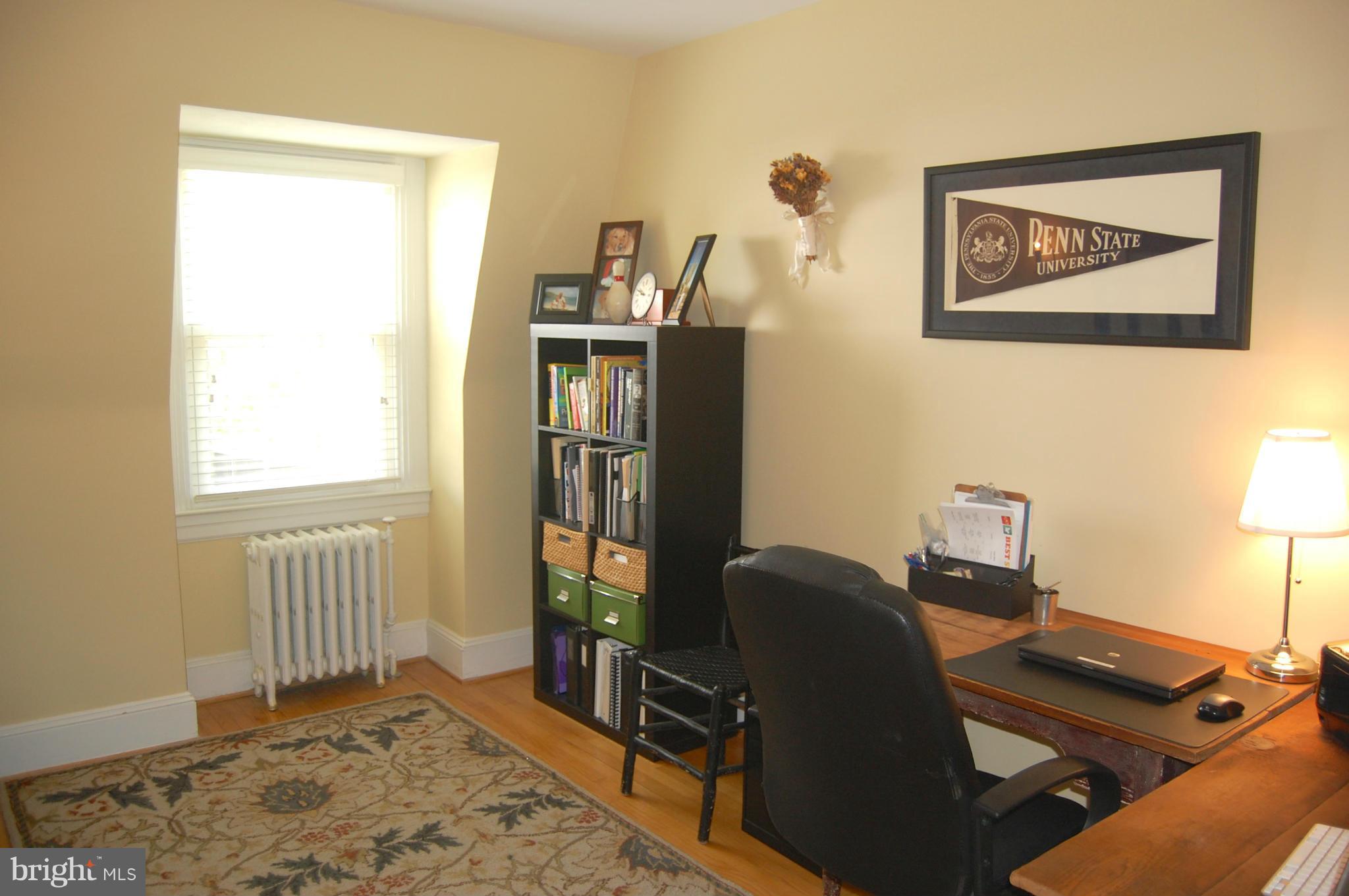 345 Tunbridge Road Baltimore, MD 21212 - Photo 24 of 30 a view of a workspace with furniture and a window