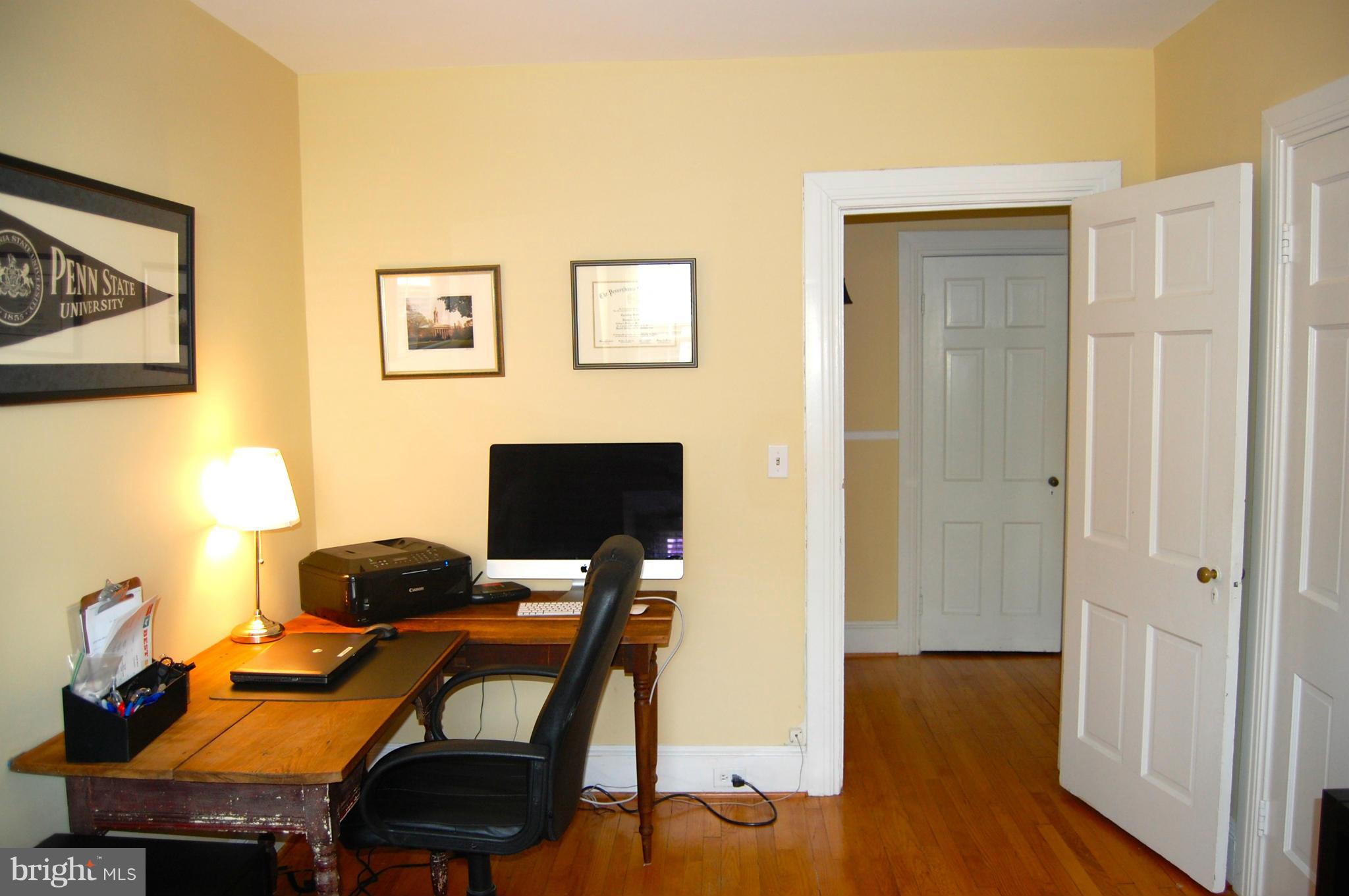 345 Tunbridge Road Baltimore, MD 21212 - Photo 25 of 30 a workspace with furniture and wooden floor