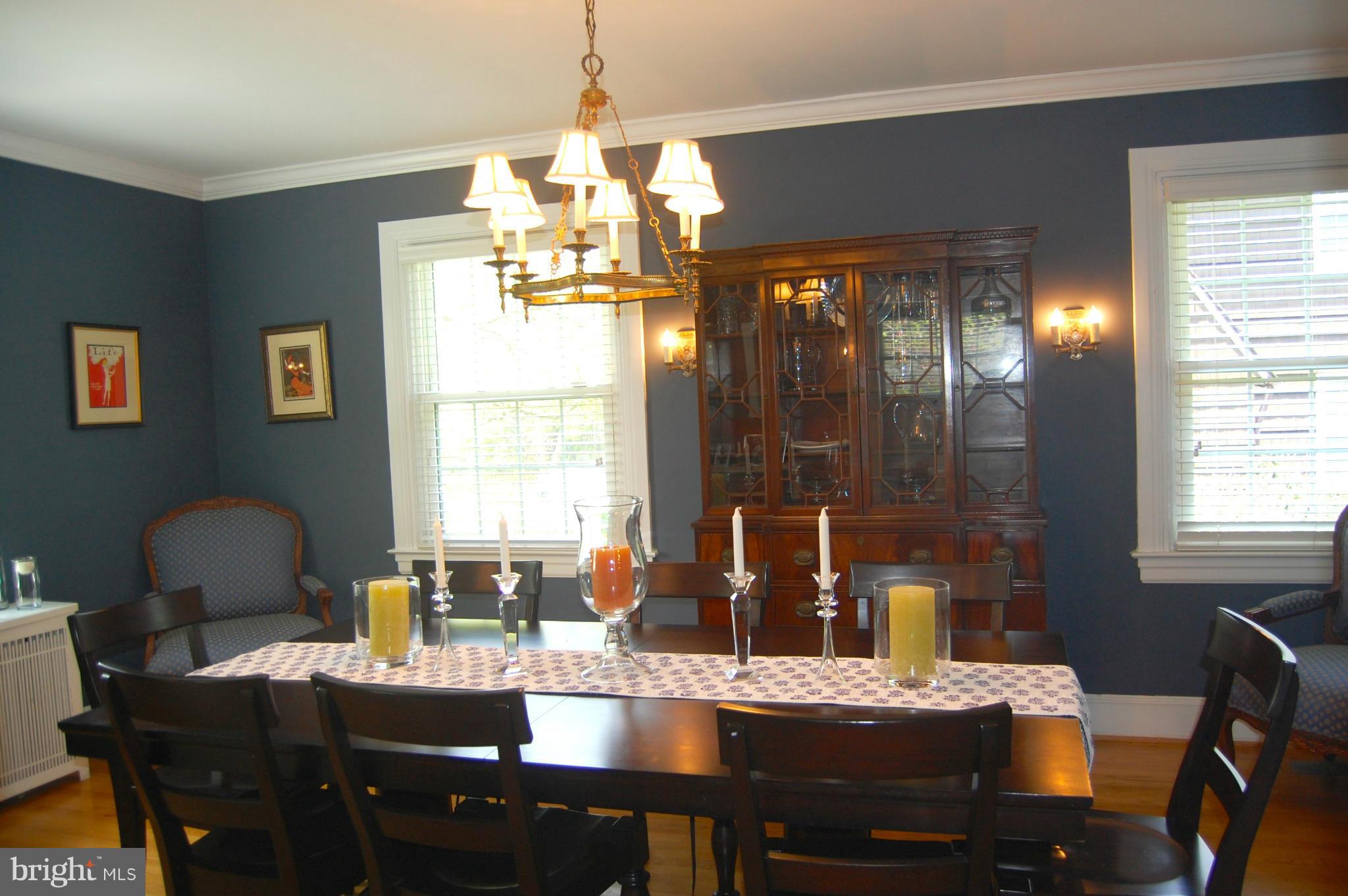 345 Tunbridge Road Baltimore, MD 21212 - Photo 7 of 30 a dining room with furniture a chandelier and window