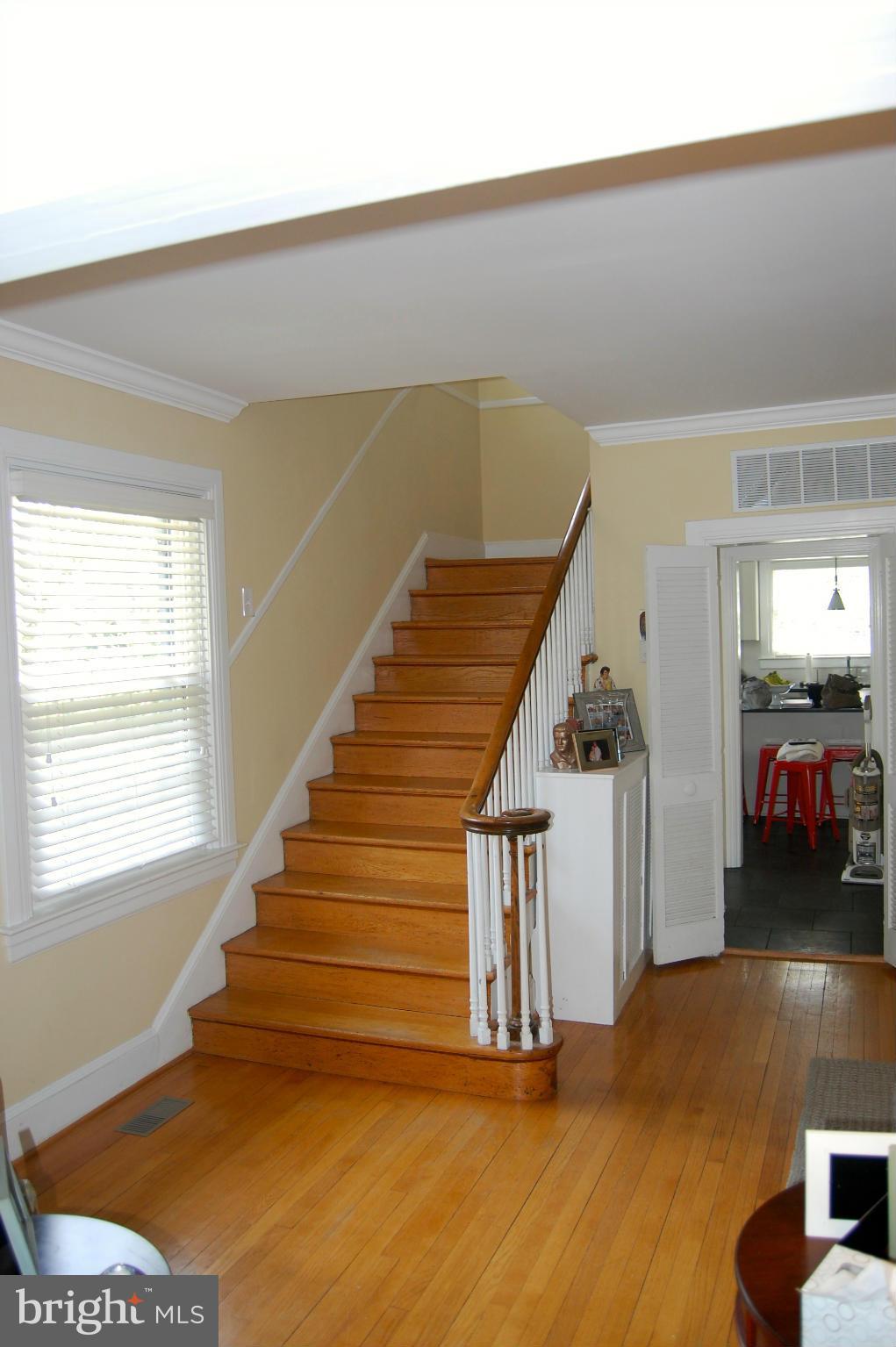 345 Tunbridge Road Baltimore, MD 21212 - Photo 8 of 30 a view of entryway and hall with wooden floor