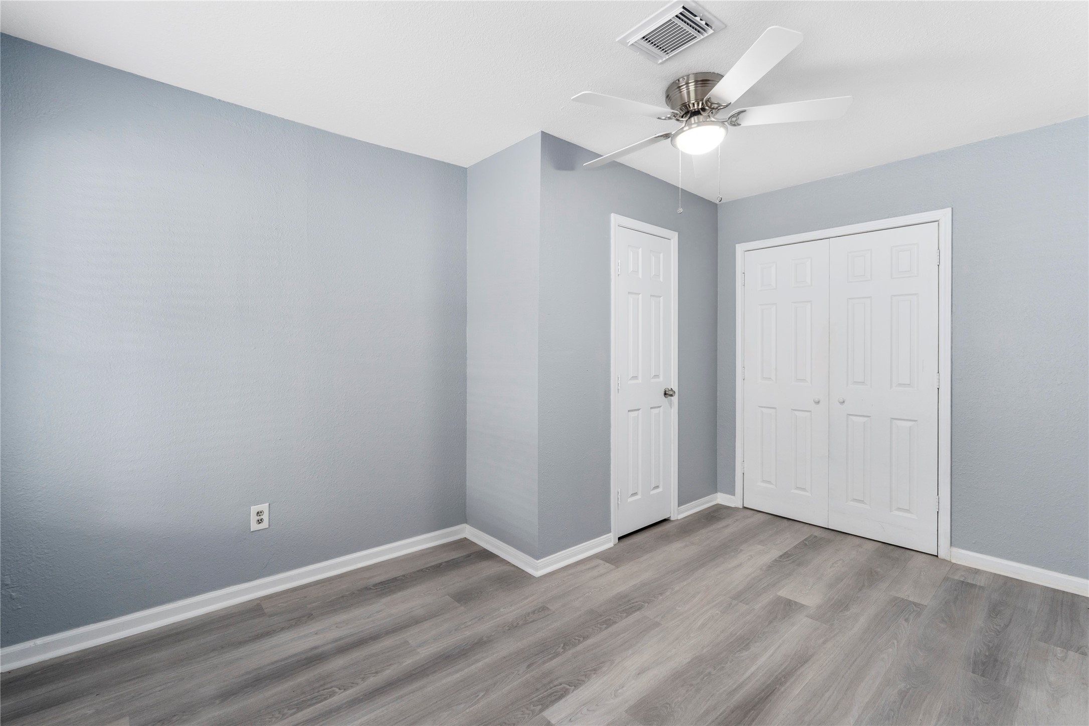 5703 Minden Street Houston, TX 77026 - Photo 15 of 20 wooden floor in an empty room