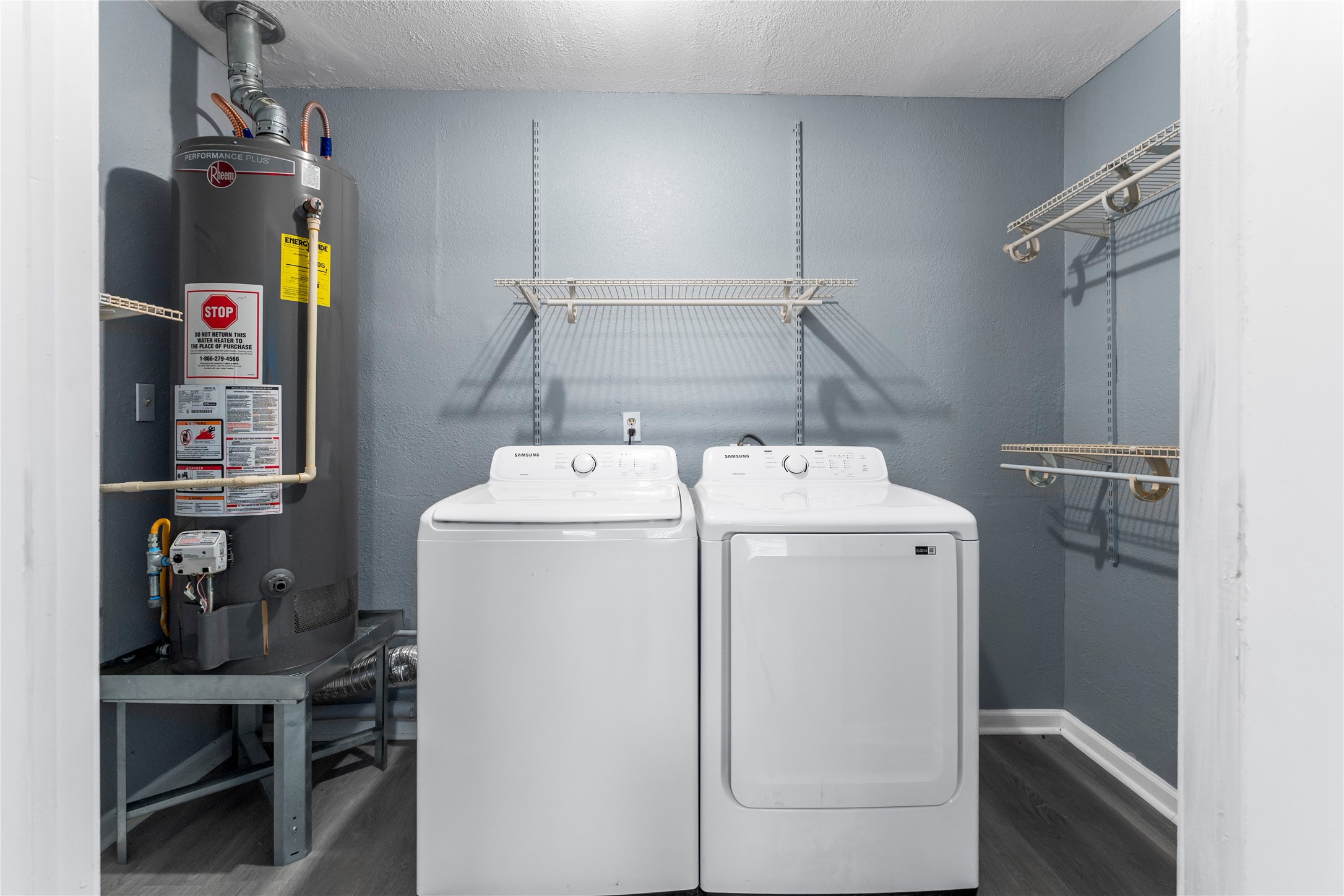 5703 Minden Street Houston, TX 77026 - Photo 16 of 20 a utility room with dryer and washer