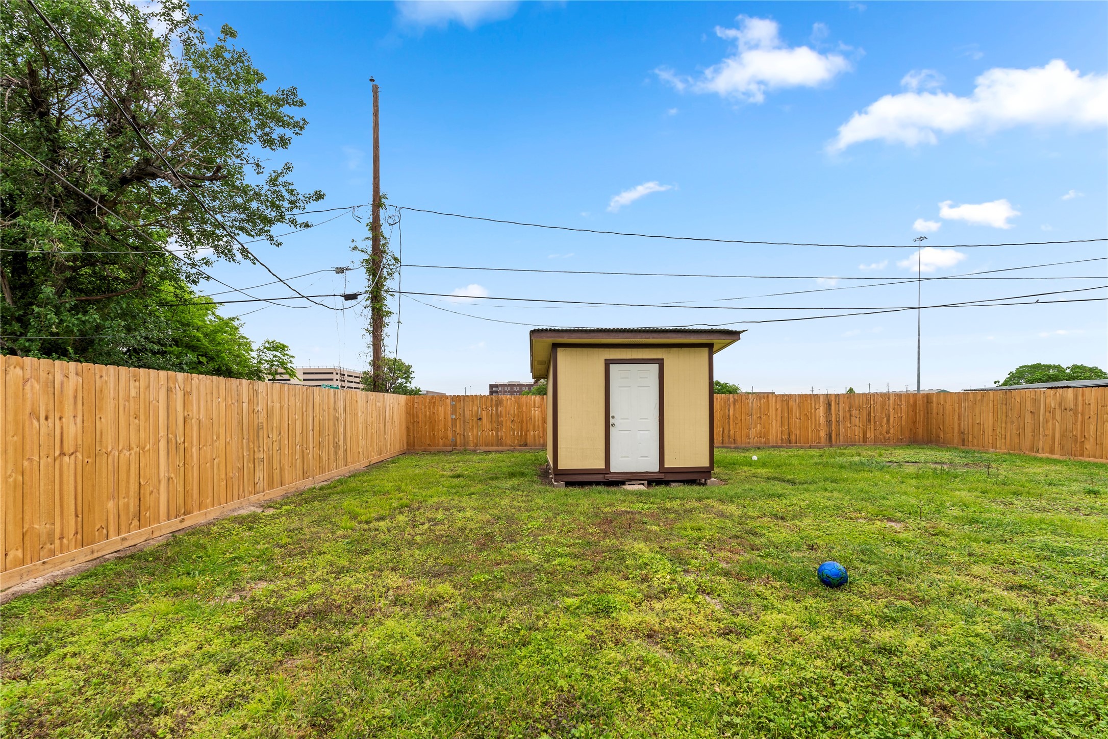 5703 Minden Street Houston, TX 77026 - Photo 17 of 20 a view of an outdoor space and a yard