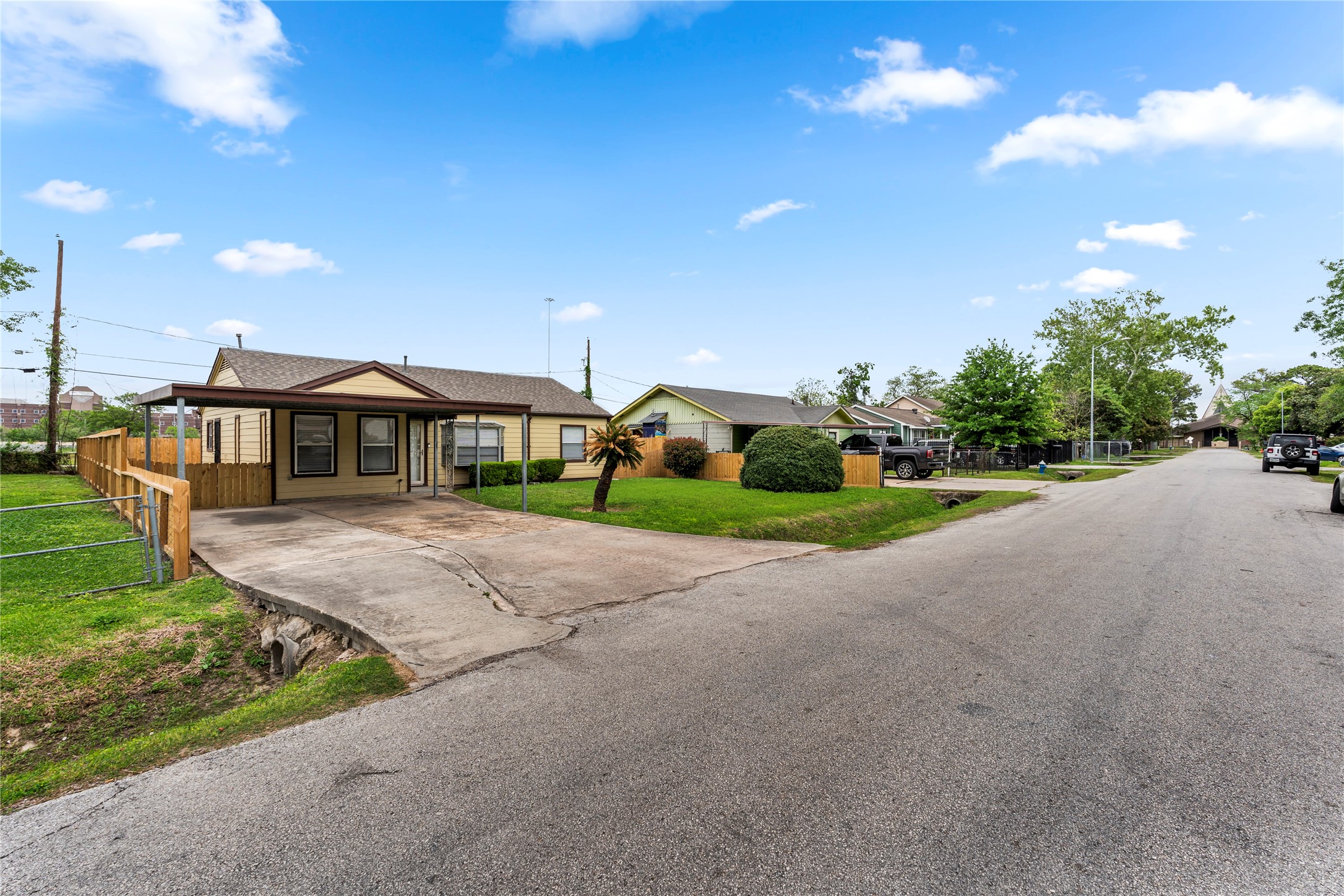 5703 Minden Street Houston, TX 77026 - Photo 19 of 20 a front view of house with yard and green space