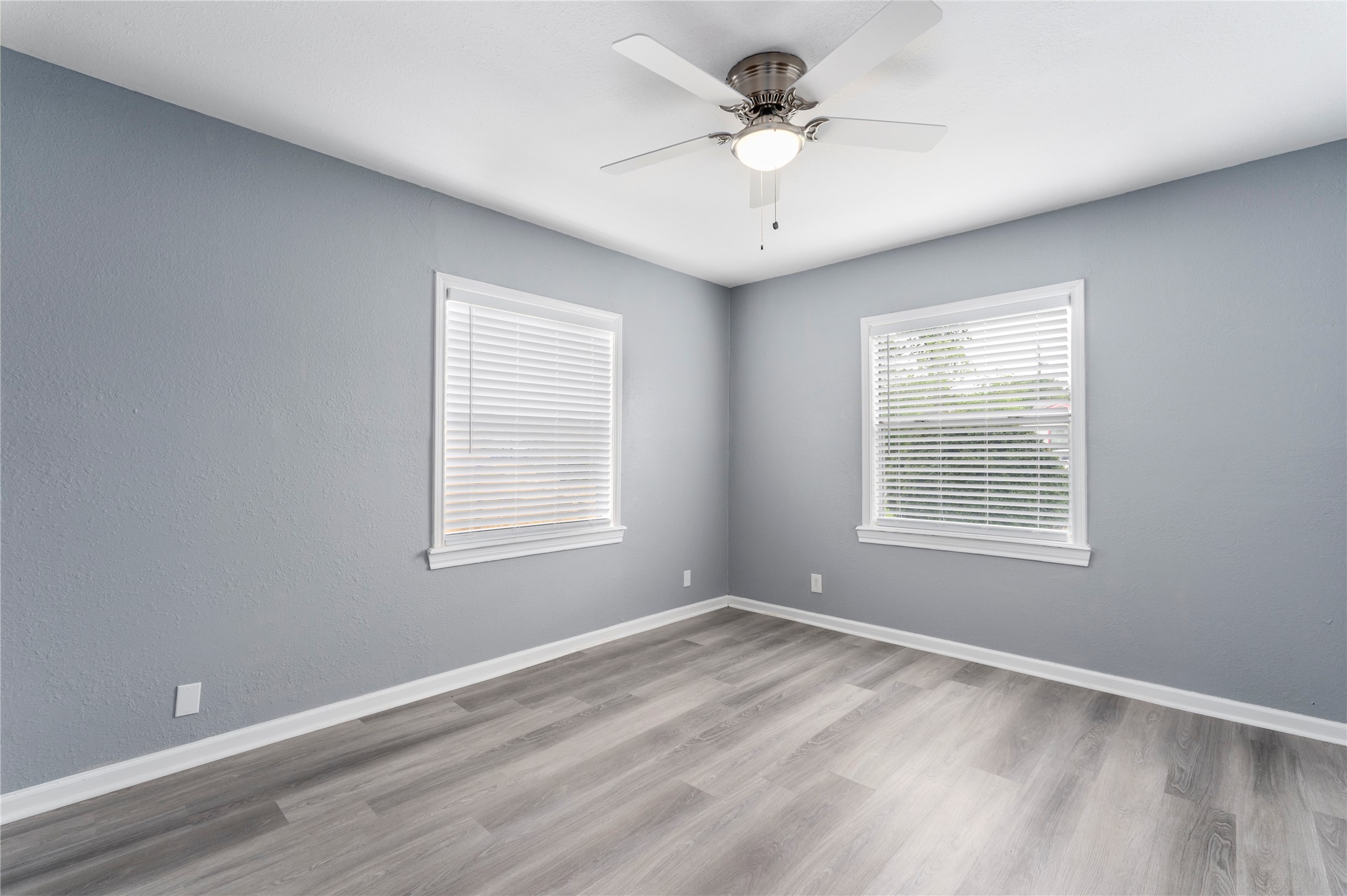 5703 Minden Street Houston, TX 77026 - Photo 8 of 20 a view of an empty room with a window