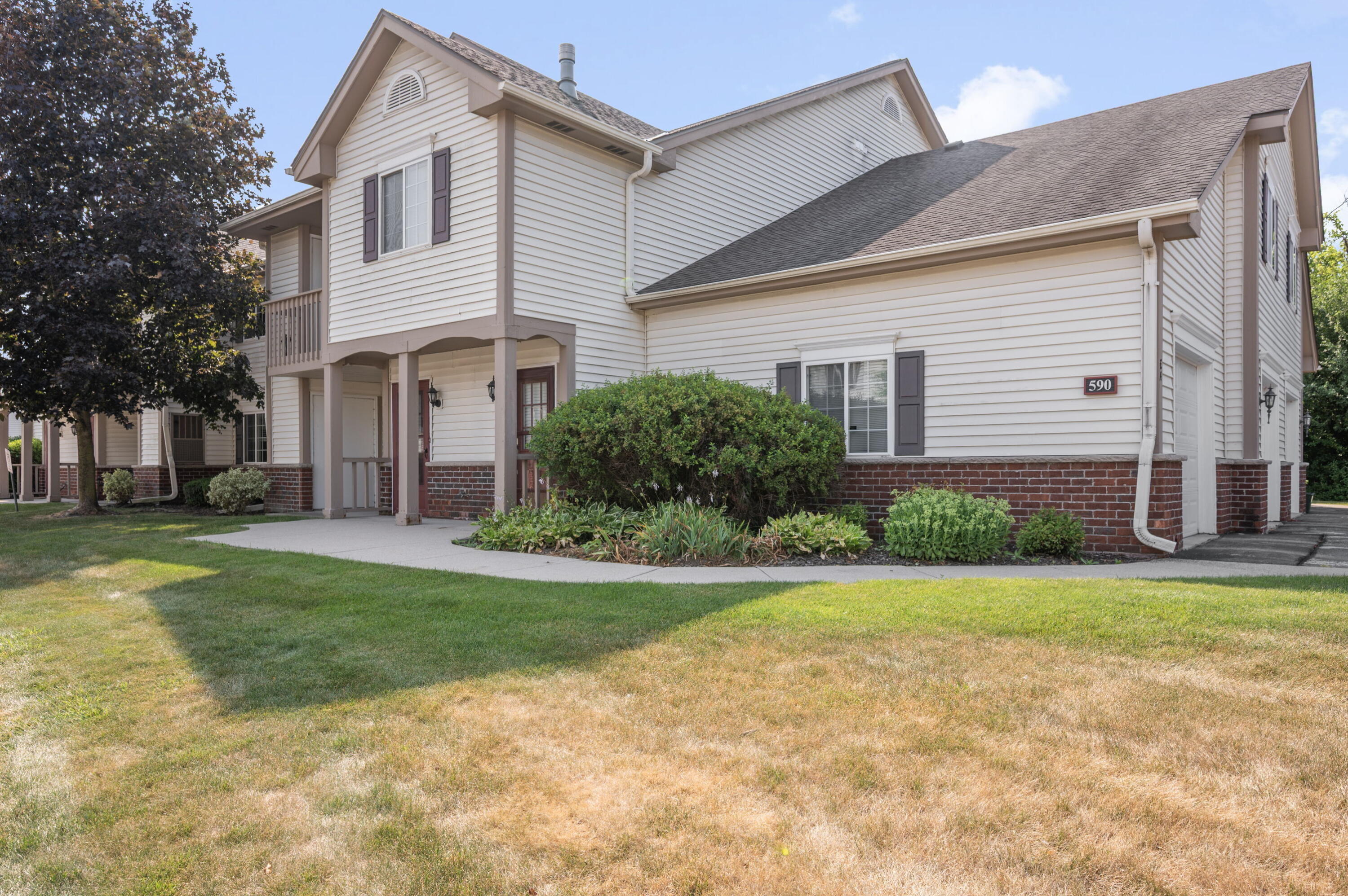 590 Pewaukee Road, Unit C Pewaukee, WI 53072 - Photo 3 of 21 Condo building