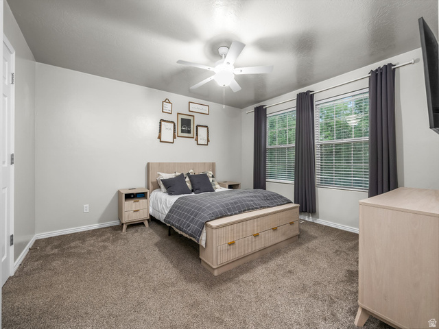 624 South 850 West Springville, UT 84663 - Photo 18 of 34 Carpeted flooring, ceiling fan, two windows with blinds, and light-toned walls