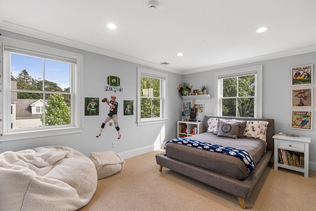 45 Bancroft Street Needham, MA 02492 - Photo 15 of 24 a living room with furniture and a large window