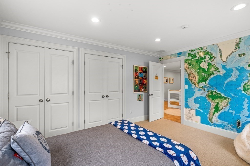 45 Bancroft Street Needham, MA 02492 - Photo 16 of 24 a bedroom with a bed and a couch