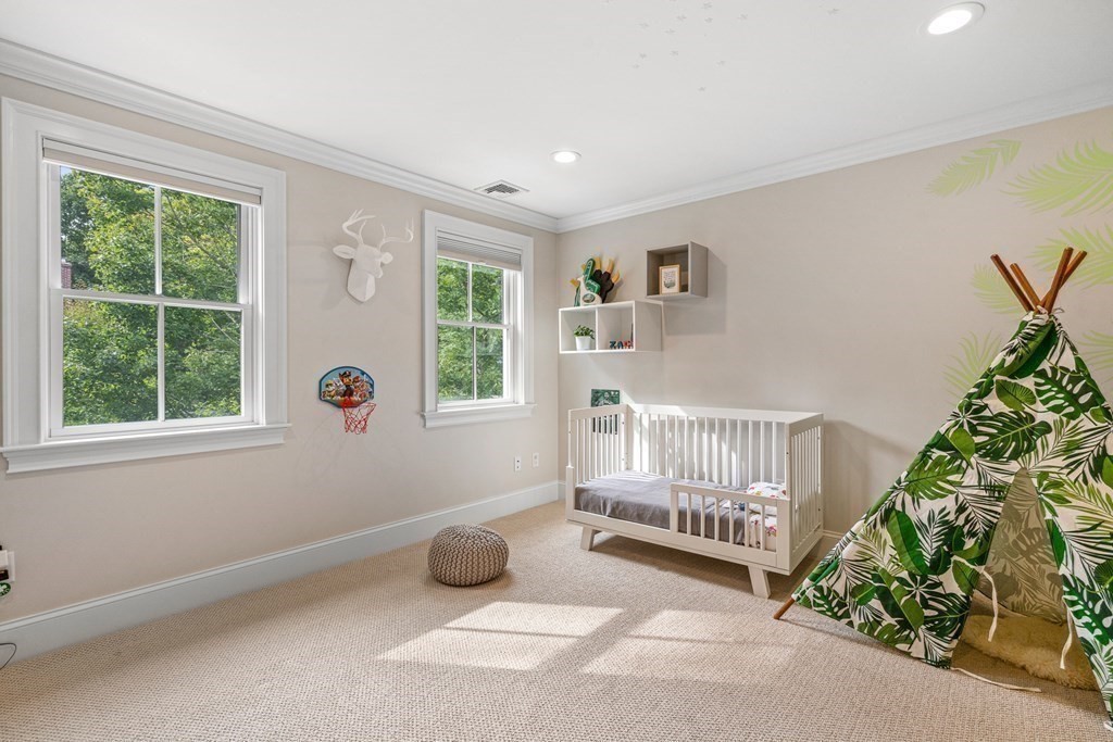 45 Bancroft Street Needham, MA 02492 - Photo 17 of 24 a view of livingroom with furniture and floor to ceiling window