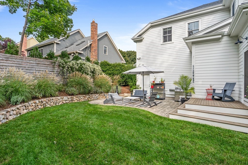 45 Bancroft Street Needham, MA 02492 - Photo 23 of 24 a view of a house with backyard and sitting area