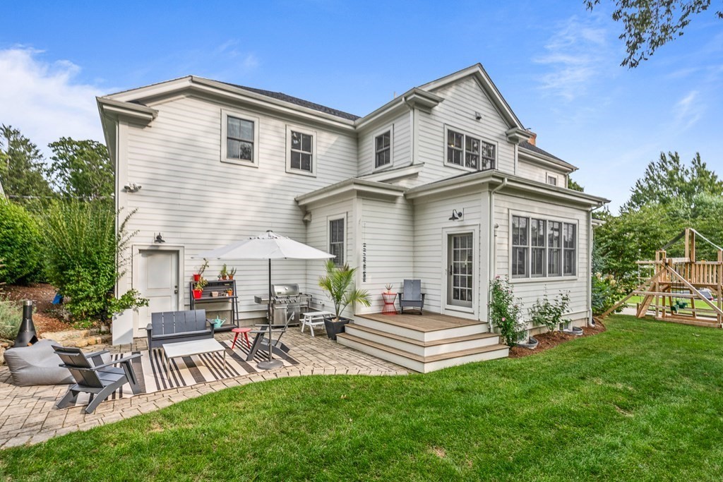 45 Bancroft Street Needham, MA 02492 - Photo 24 of 24 a front view of house with yard and outdoor seating