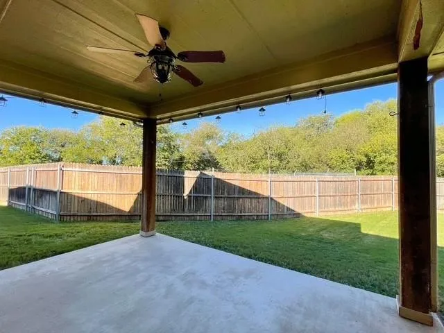 a view of a porch with a backyard