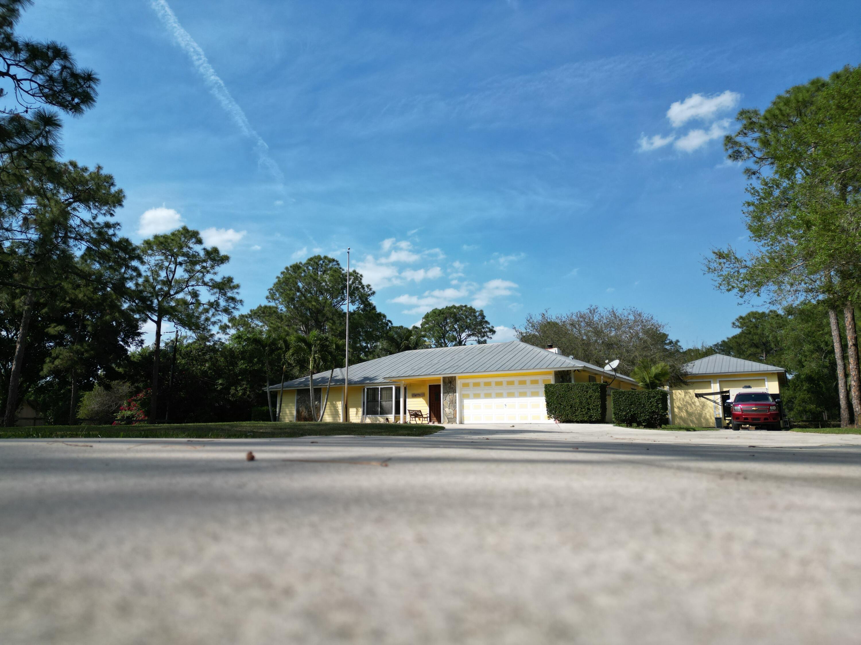 12785 Sandy Run Road Jupiter, FL 33478 - Photo 3 of 48 9ground floor
