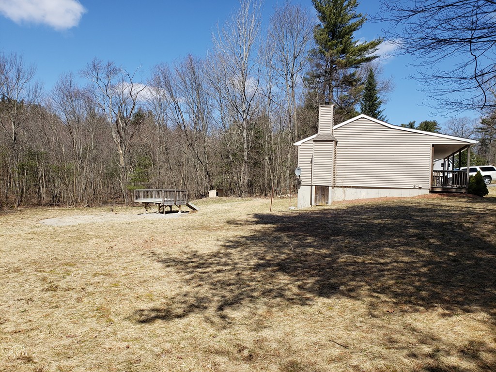 60 Haggerty Road Charlton, MA 01507 - Photo 24 of 28 a view of yard covered with snow