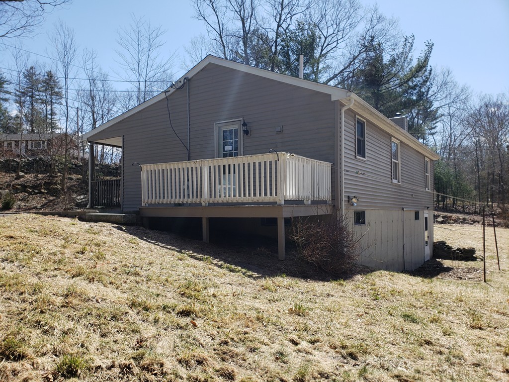 60 Haggerty Road Charlton, MA 01507 - Photo 3 of 28 a view of a house with a yard covered in snow