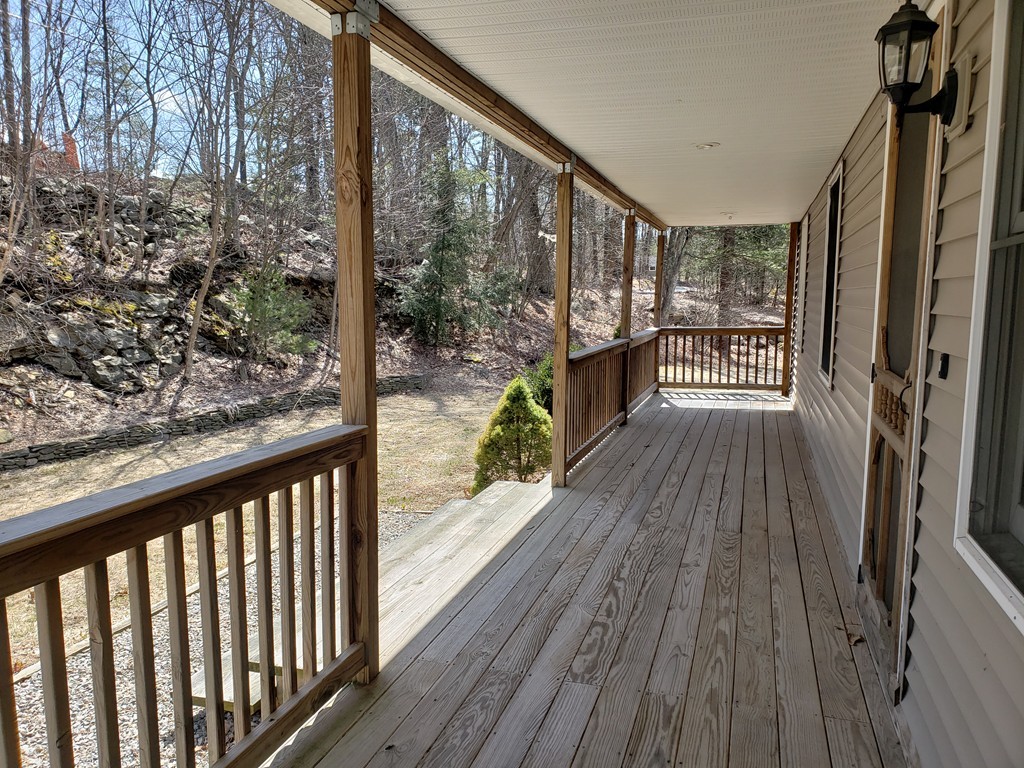 60 Haggerty Road Charlton, MA 01507 - Photo 5 of 28 a view of balcony with wooden floor