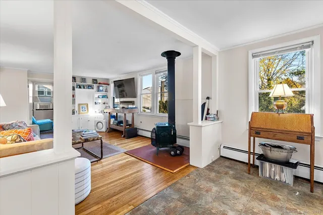 a living room with furniture and a window