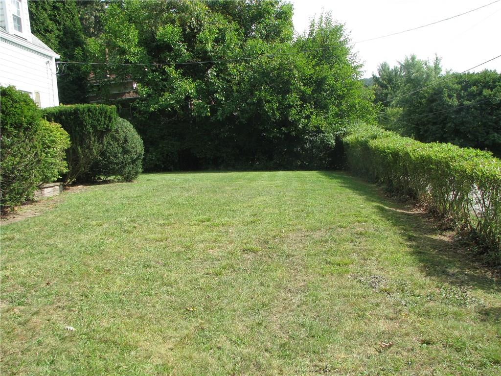1101 Isabella Road Connellsville, PA 15425 - Photo 23 of 25 The front yard of this home is large and spacious.
