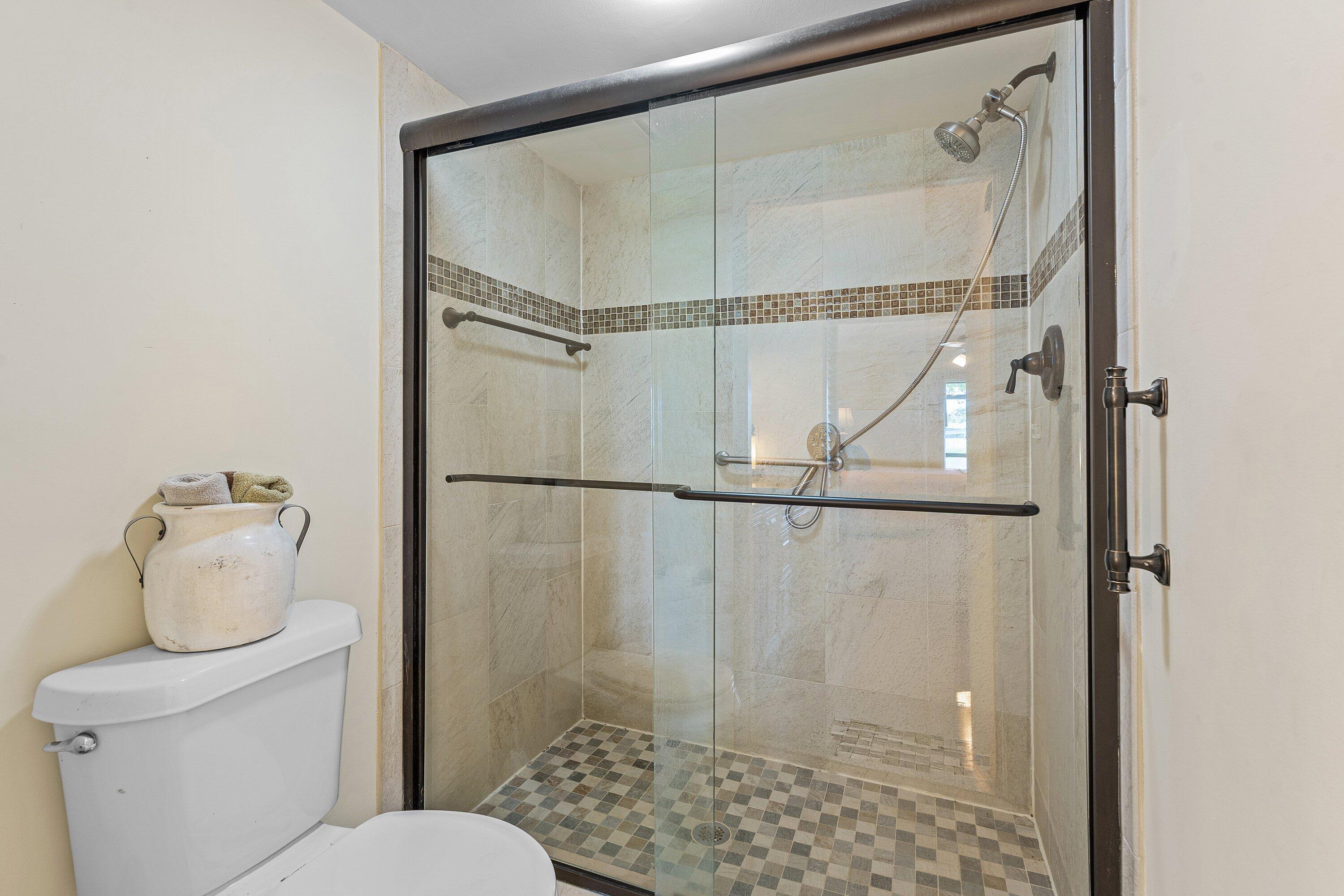 1111 Keystone Drive, Unit B Jupiter, FL 33458 - Photo 21 of 42 Beautifully Updated Master Bathroom!