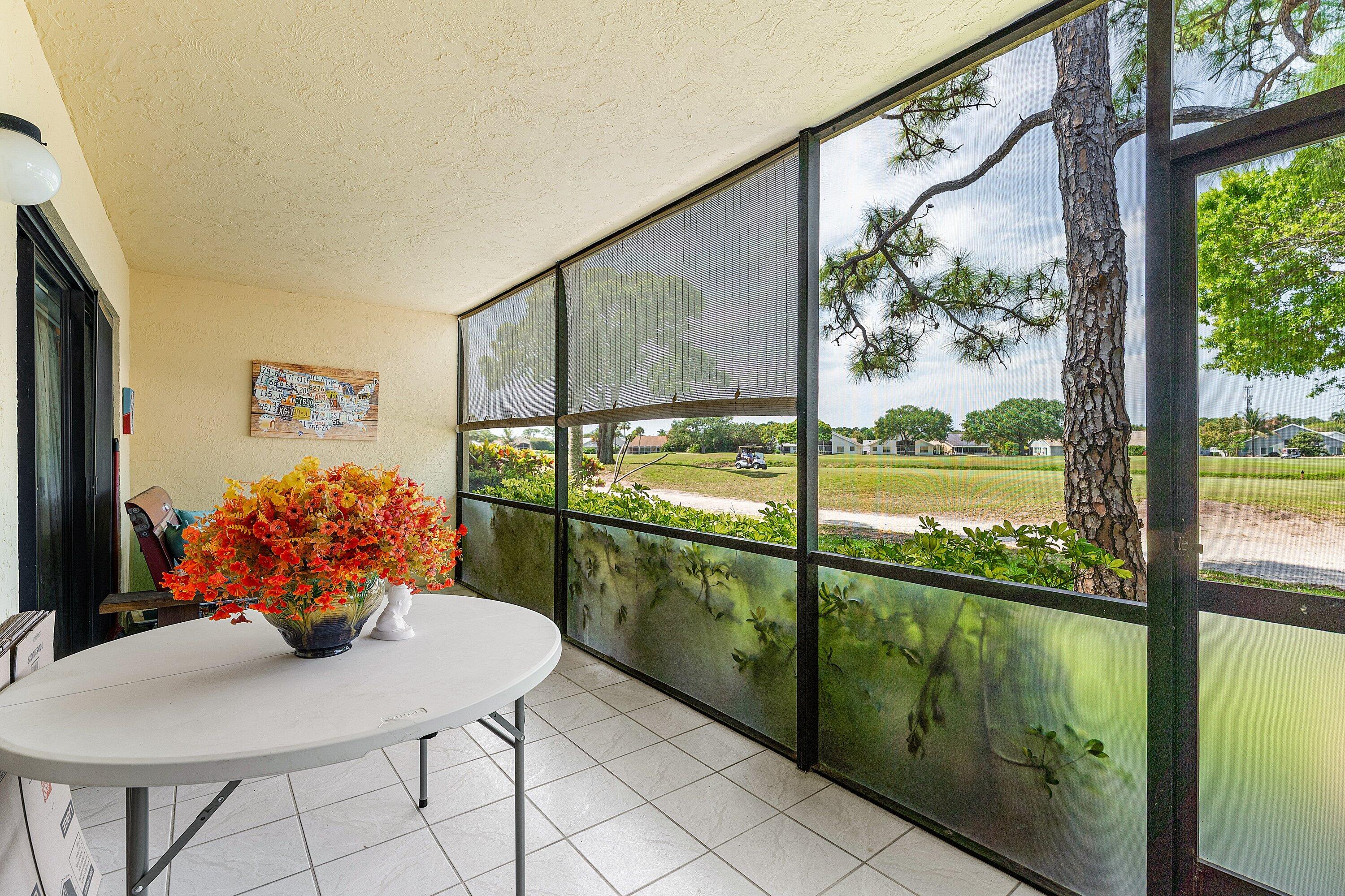1111 Keystone Drive, Unit B Jupiter, FL 33458 - Photo 28 of 42 Refreshing Covered Screened Patio!