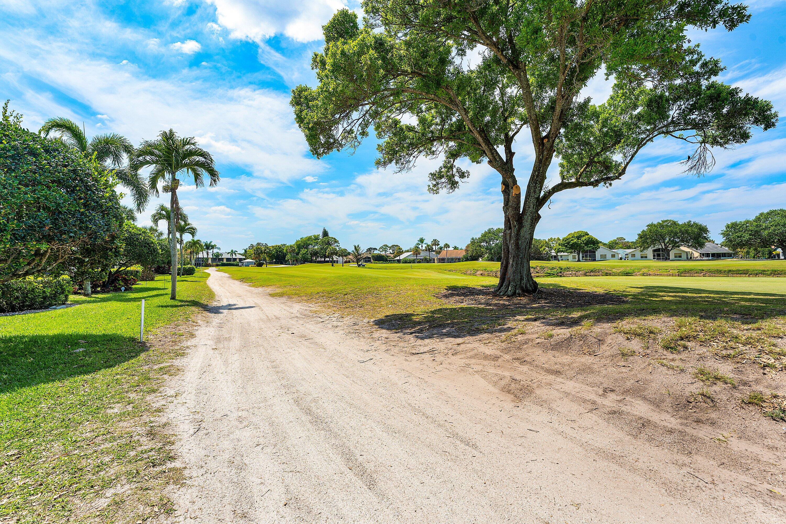 1111 Keystone Drive, Unit B Jupiter, FL 33458 - Photo 33 of 42 Overlooking the Lake and Golf Course!!!