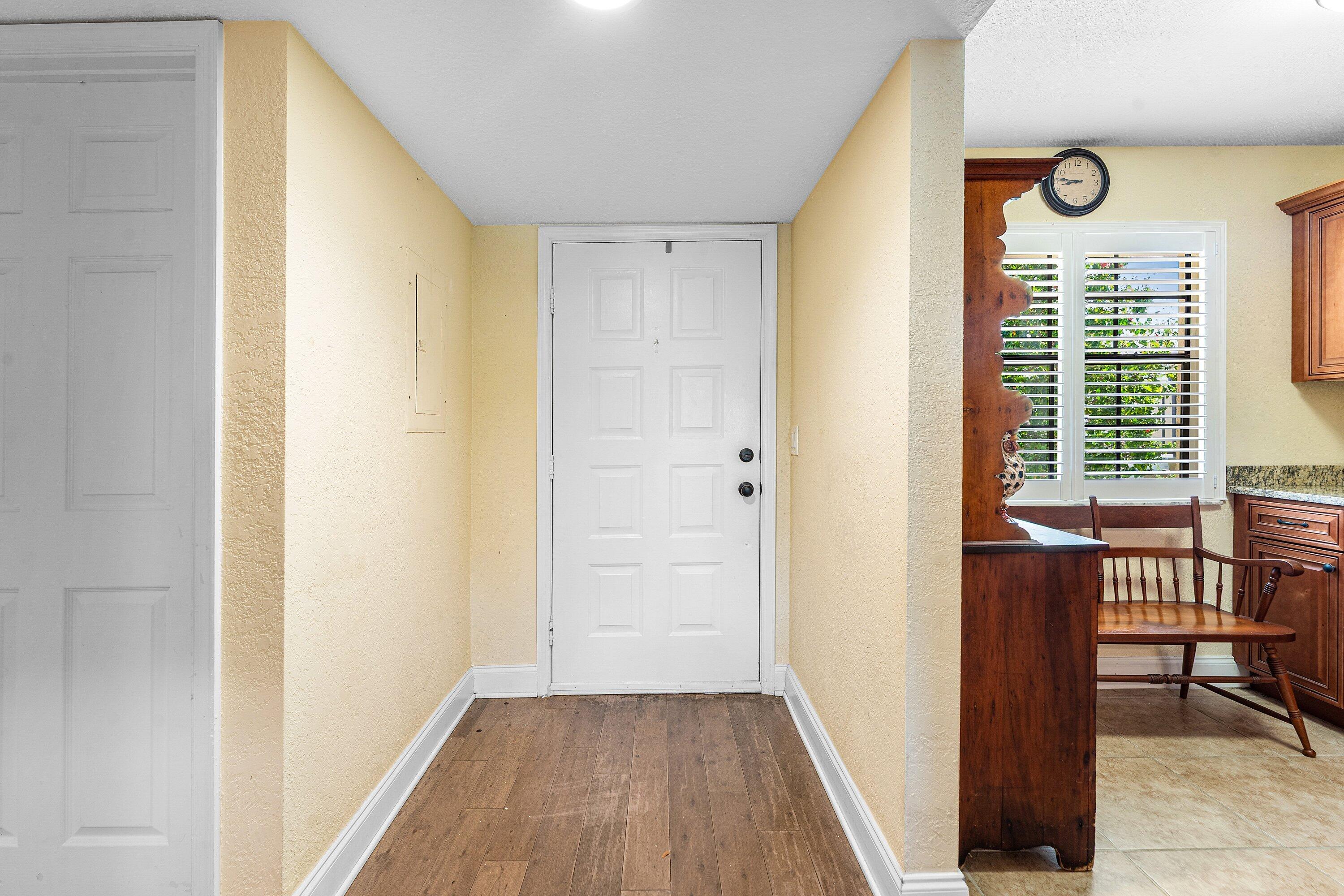 1111 Keystone Drive, Unit B Jupiter, FL 33458 - Photo 6 of 42 Foyer Entrance!