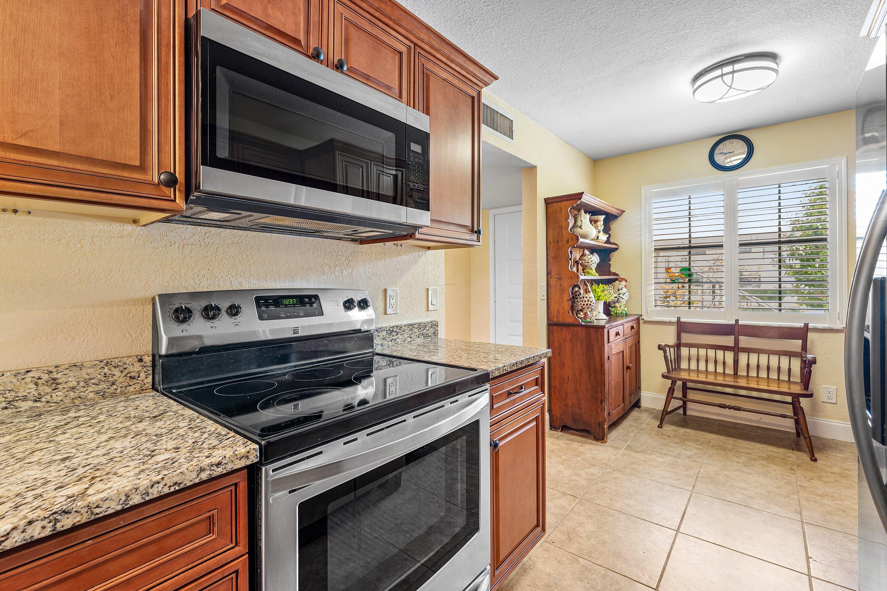 1111 Keystone Drive, Unit B Jupiter, FL 33458 - Photo 10 of 42 Extra Cabinets & Large Pantry!