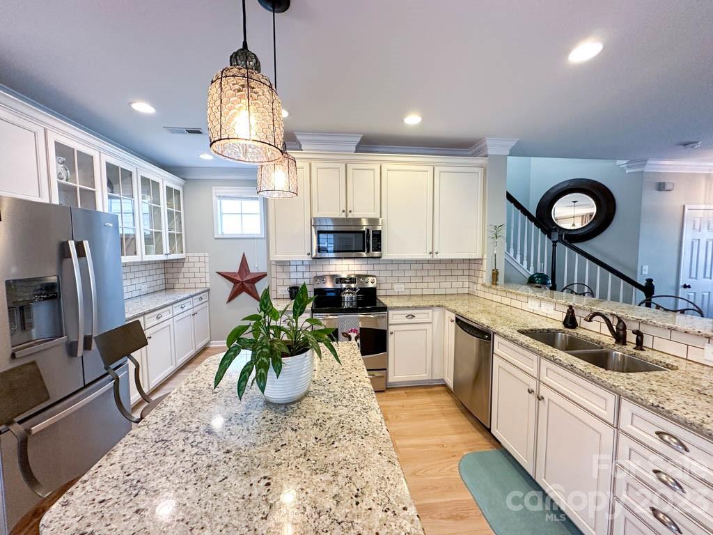 3470 Richard's Crossing Fort Mill, SC 29708 - Photo 7 of 29 a kitchen with a sink stove and microwave