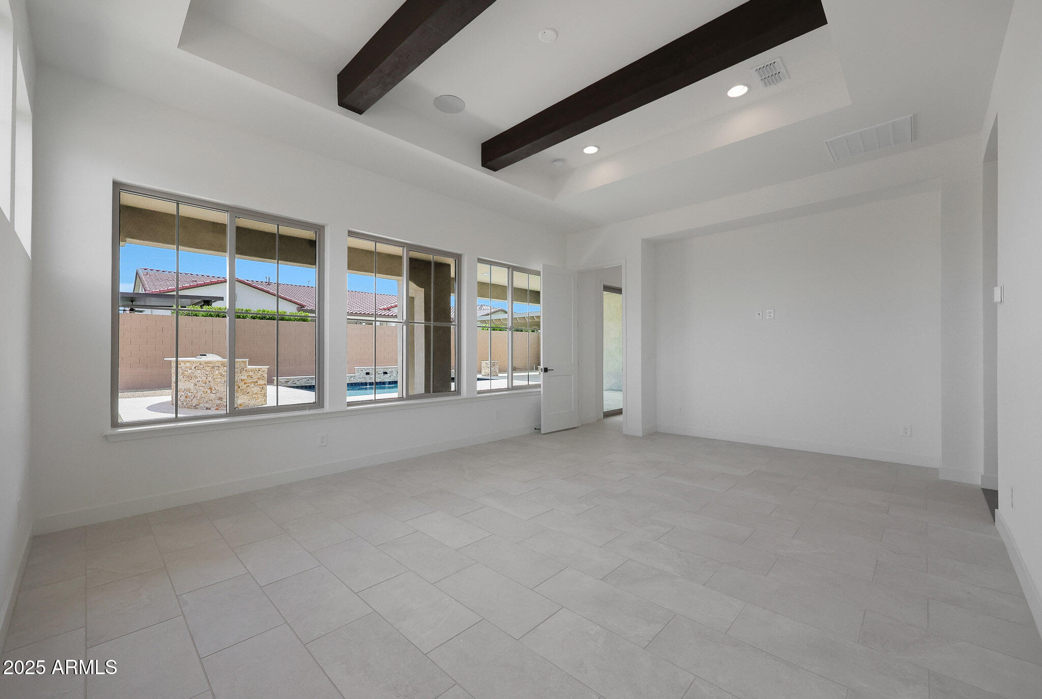 20775 West Rattler Road Buckeye, AZ 85396 - Photo 34 of 90 an empty room with windows