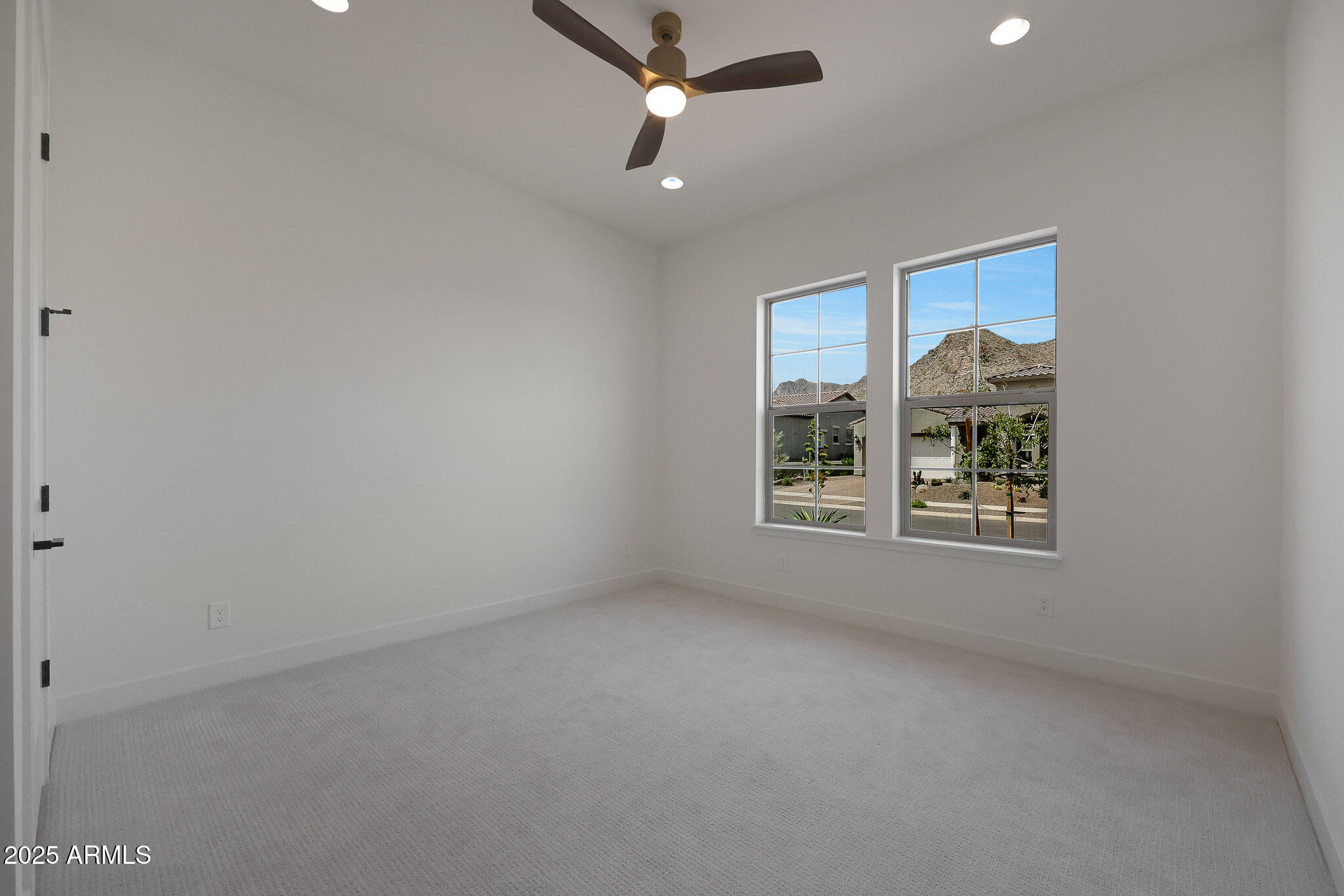 20775 West Rattler Road Buckeye, AZ 85396 - Photo 46 of 90 a view of an empty room with a window