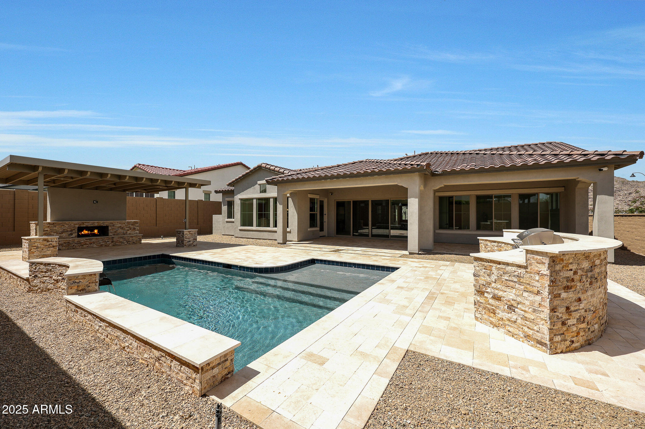 20775 West Rattler Road Buckeye, AZ 85396 - Photo 63 of 90 a view of a house with swimming pool and sitting area