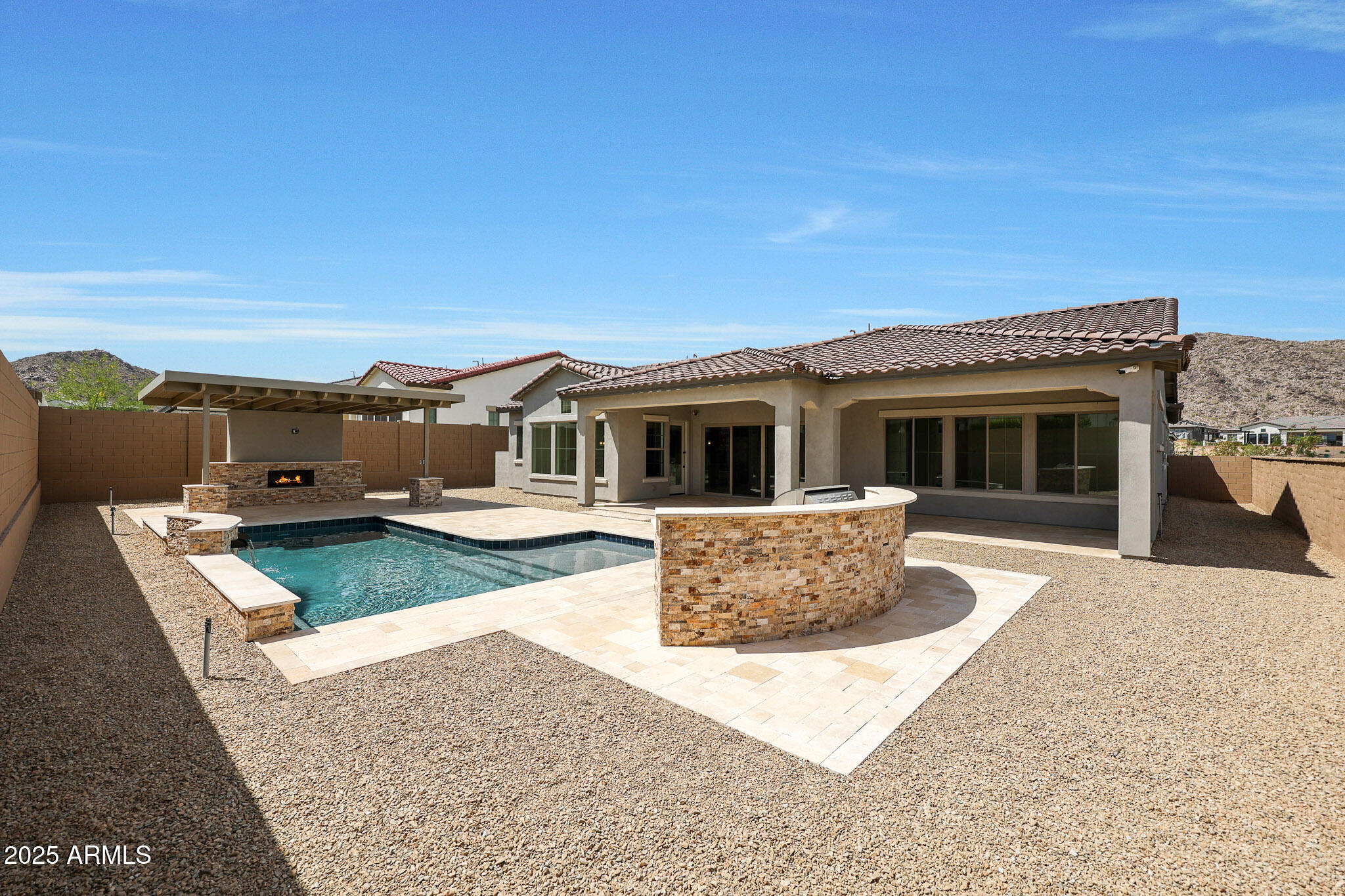 20775 West Rattler Road Buckeye, AZ 85396 - Photo 65 of 90 a front view of a house with a yard