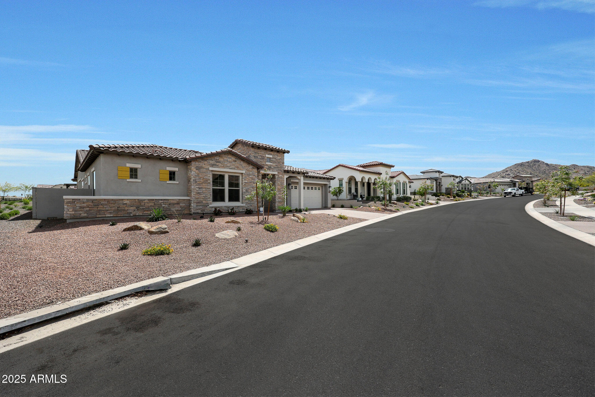 20775 West Rattler Road Buckeye, AZ 85396 - Photo 7 of 90 a view of a house with a road from a balcony