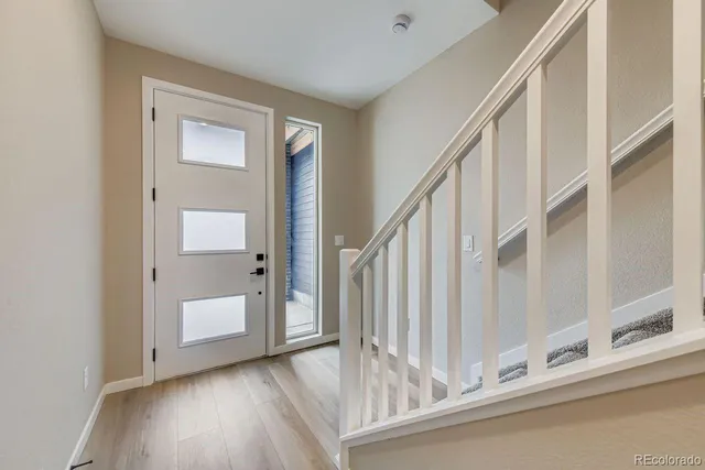 a view of front door with hallway