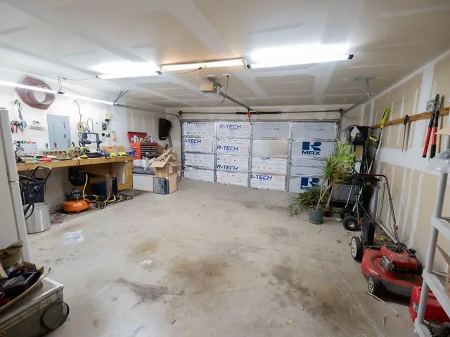 an aerial view of a house with outdoor space