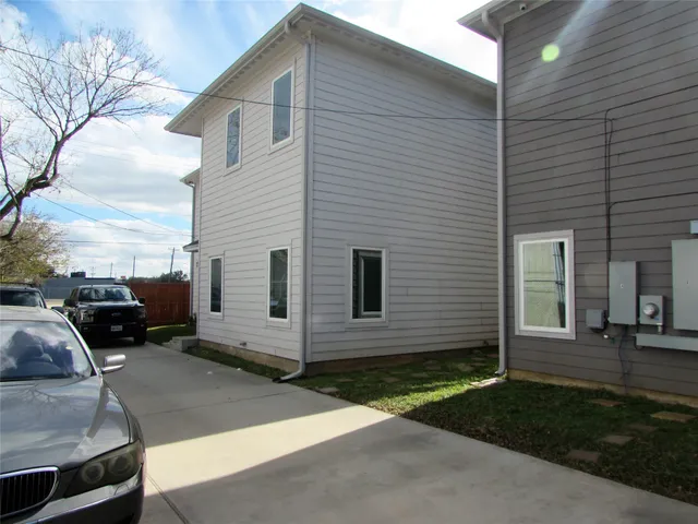 a view of a backyard with sitting area