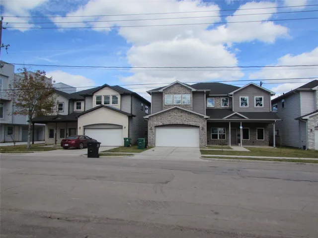 a view of a building with a street