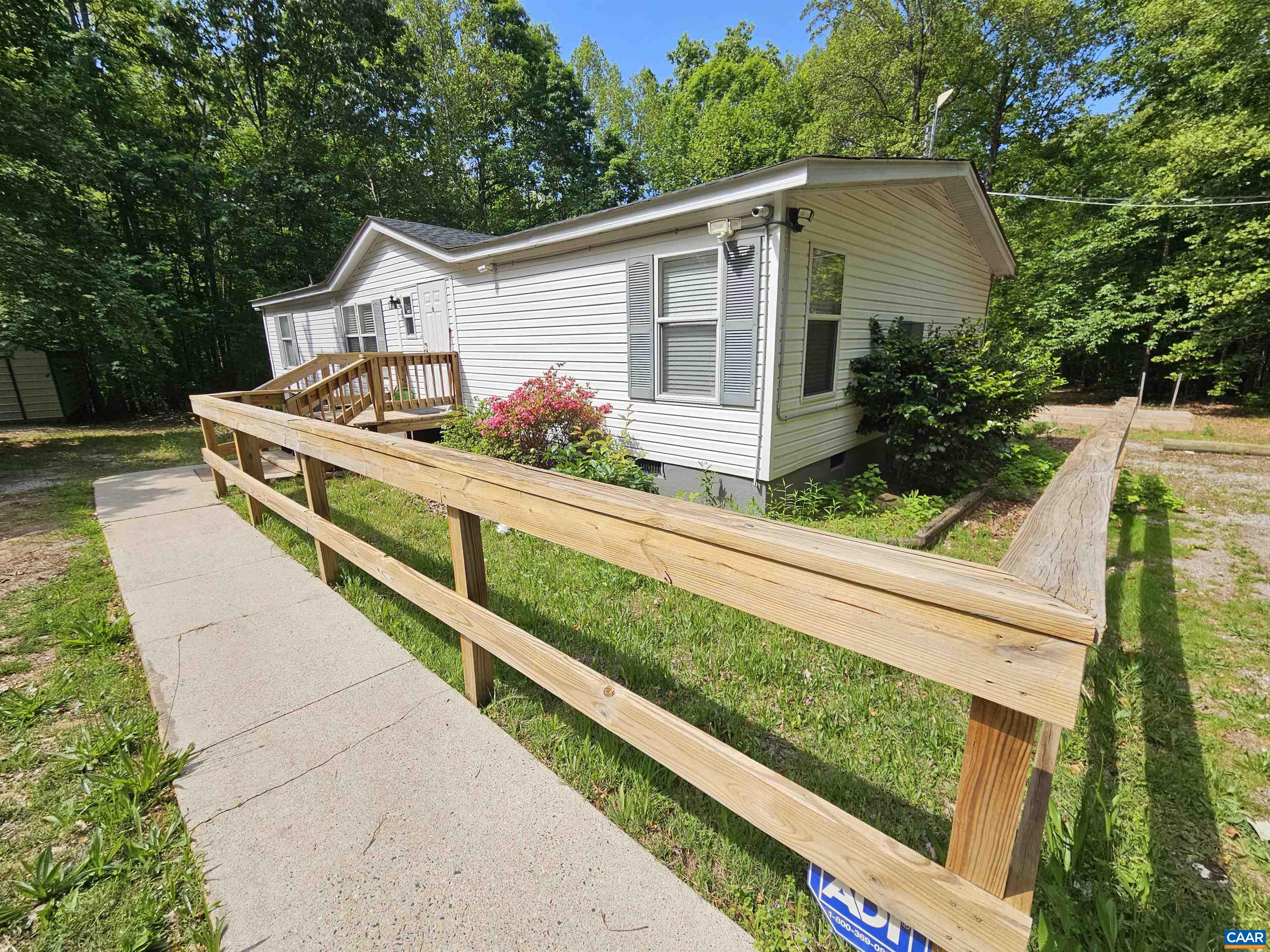 981 Scotts Bottom Road Dillwyn, VA 23936 - Photo 1 of 62 a view of house with wooden deck and yard