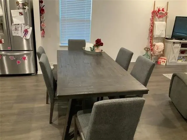 a kitchen with stainless steel appliances granite countertop a sink stove and microwave