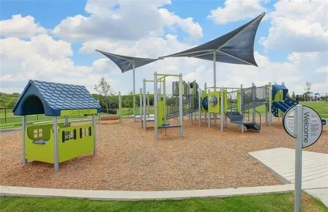 a front view of a house with yard