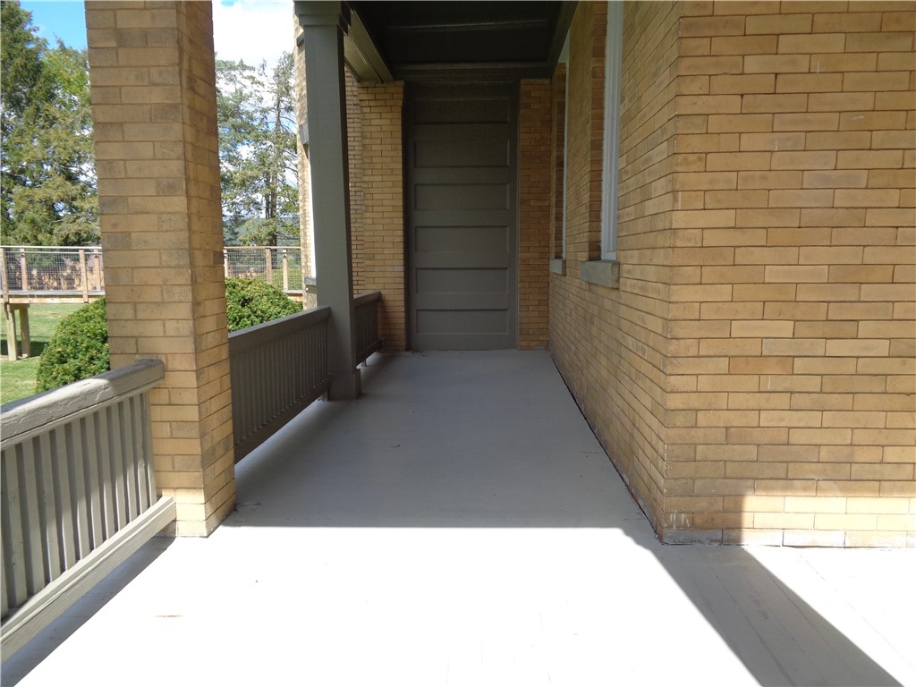 22 West 3rd Street, Unit 102 Corning, NY 14830 - Photo 18 of 19 THis porch is for this apartment use only