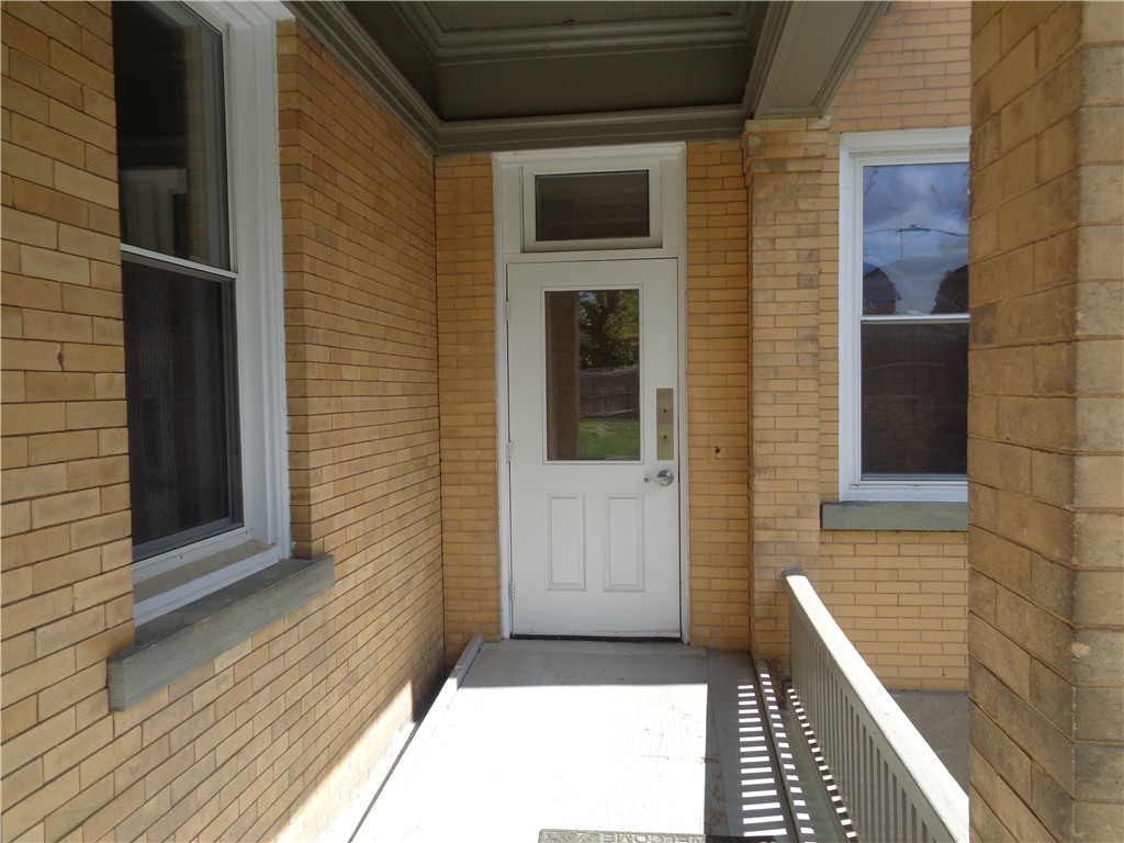22 West 3rd Street, Unit 102 Corning, NY 14830 - Photo 19 of 19 Private Entrance directly form the porch into the