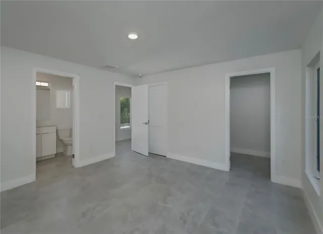 a kitchen with stainless steel appliances a refrigerator sink and stove